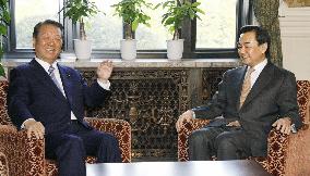 Ex-Japan envoy Wang meets with Ozawa