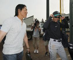 Ichiro and H. Matsui at preseason match