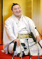 Sumo champ Hakuho 'relieved' with title