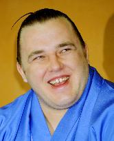 Estonian sumo wrestler Baruto speaks to reporters
