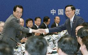 Japan, China vow to cooperate on sustained recovery