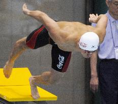 Kitajima marks return to nationals with record-breaking swim