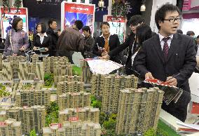 China's 1st qtr GDP up 11.9% on year