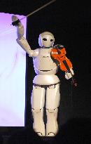 Humanoid robot plays violin in Shanghai Expo rehearsal