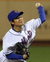 Takahashi earns 1st MLB win