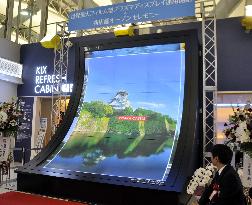 Large curved plasma screen at Kansai airport