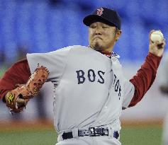 Red Sox's Okajima pitches