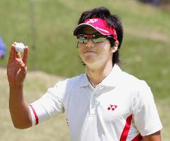 Ishikawa shoots tour record 58 to win Crowns