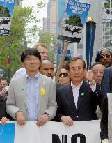 Japanese A-bomb survivors, mayors march for nuke-free world