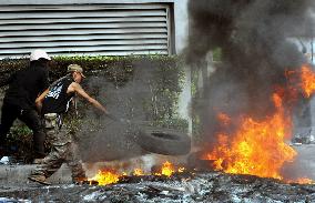 Bangkok stays relatively quiet Tuesday, but incidents persist