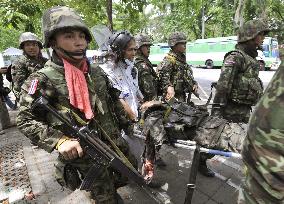 Thai protest leaders surrender, curfew set for Bangkok