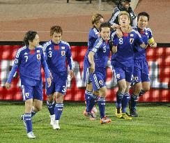 Japan overpower Denmark to cruise into last 16