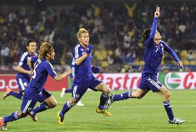 Japan overpower Denmark to cruise into last 16