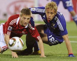 Japan overpower Denmark to cruise into last 16