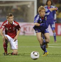 Japan overpower Denmark to cruise into last 16