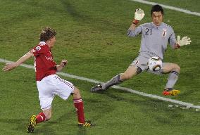 Japan overpower Denmark to cruise into last 16