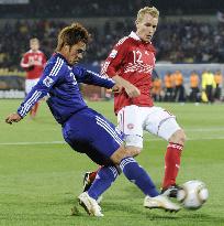 Japan overpower Denmark to cruise into last 16