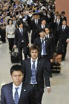 Japan's World Cup squad return home from South Africa