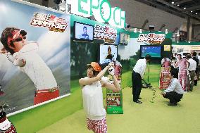 Golf simulation game displayed at International Tokyo Toy Show