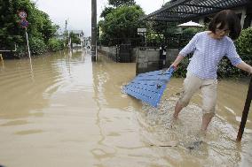 Heavy rain wrecks havoc in western Japan
