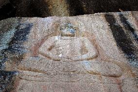 Swat valley's giant Buddha has lost its smile