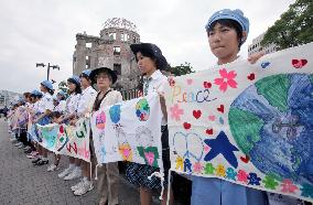 Banners for peace encircle A-Bomb Dome in Hiroshima
