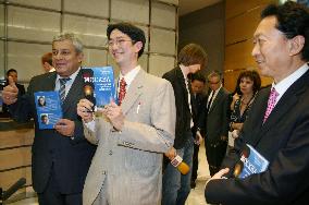 Ex-PM Hatoyama's son shows off new book in Russia