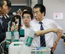 Kan visits small factories in Tokyo