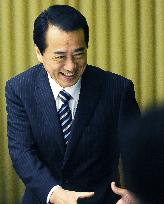 Kan keeps power beating Ozawa in election