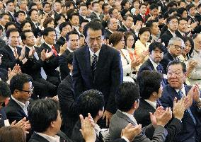 Kan reelected as leader of governing party
