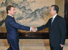 China, Russia vow to boost strategic partnership