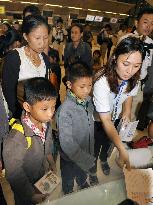 Myanmar refugees depart for Japan