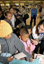 Myanmar refugees depart for Japan