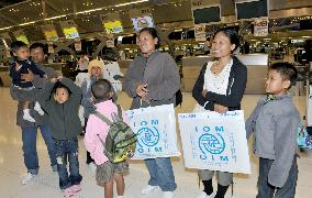 Myanmar refugees depart for Japan