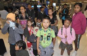 Myanmar refugees depart for Japan