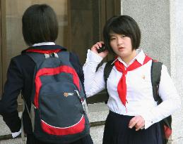 N. Korean student with cellphone