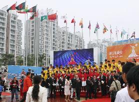 Chinese delegation arrives at athletes' village for Asian Games