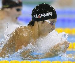 Tateishi strikes 100-meter breaststroke gold