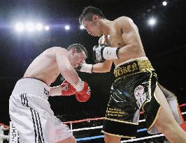 Ao wins WBC super featherweight crown