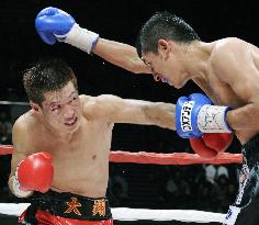 Hasegawa wins WBC featherweight title