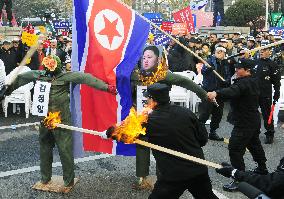 South Koreans protest N. Korean attack