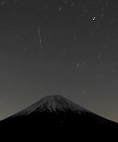 Geminid meteor shower over Mt. Fuji