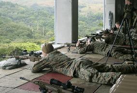 U.S. Marines shooting drill at Camp Hansen