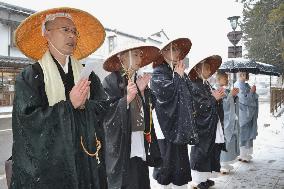 Monks in snow