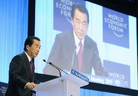 Kan pushes opening of Japan at Davos