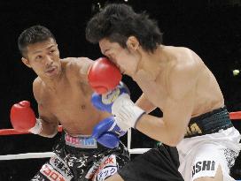 Uchiyama retains WBA crown with TKO after eight rounds