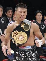 Uchiyama retains WBA crown with TKO after eight rounds