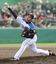 Saito throws scoreless inning in exhibition debut