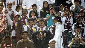 Soccer fans in Doha