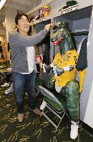 A's welcome Matsui with Godzilla figure